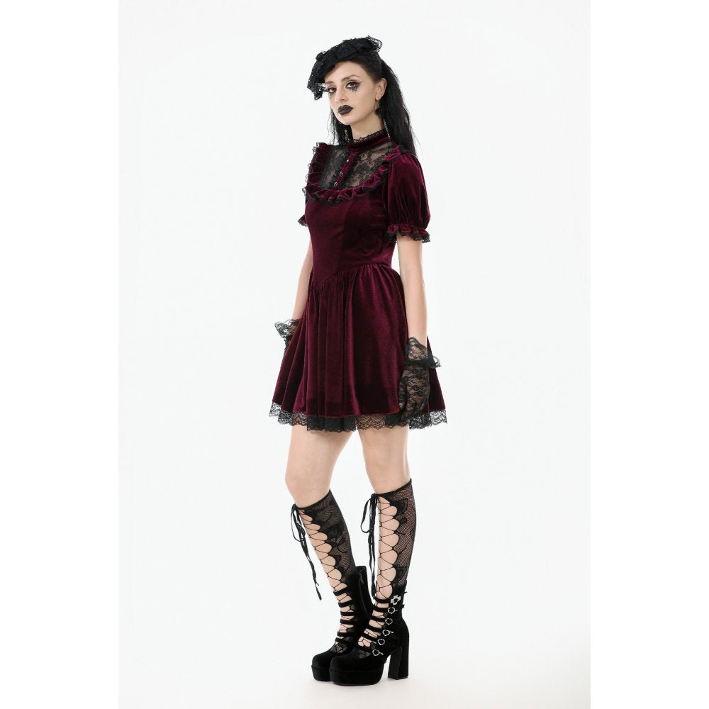 Full view of the Ophelia Lace Collar Burgundy Velvet Goth Dress at a gothic event, illustrating its luxurious fabric and dramatic silhouette.