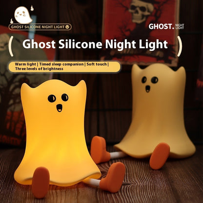Ghost Silicone Night Light styled as a charming ghost with a warm yellow glow, showcasing its elegant design and touch control feature for added luxury in home decor.