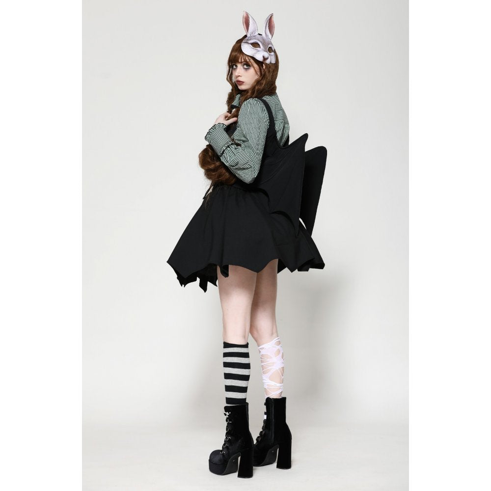 Model wearing the Dark in Love Vespertilio Vest, accentuating the dramatic bat wings and stylish silhouette for a striking evening look.