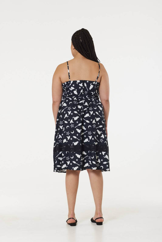 Elegant Witch Print Midi Fit & Flare Dress featuring lace hem and sweetheart neckline, ideal for a chic, enchanting look. Available in plus sizes.