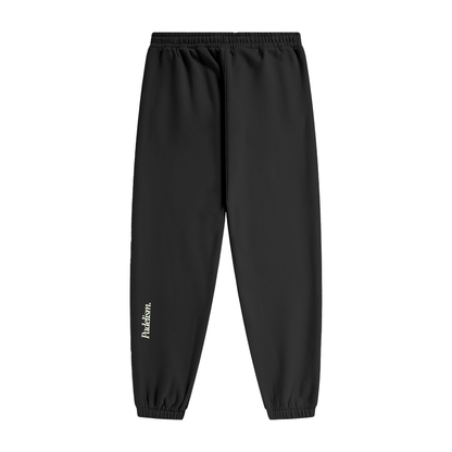 Premium heavyweight fleece joggers for men and women, showcasing a sleek design, perfect for autumn and winter styling.