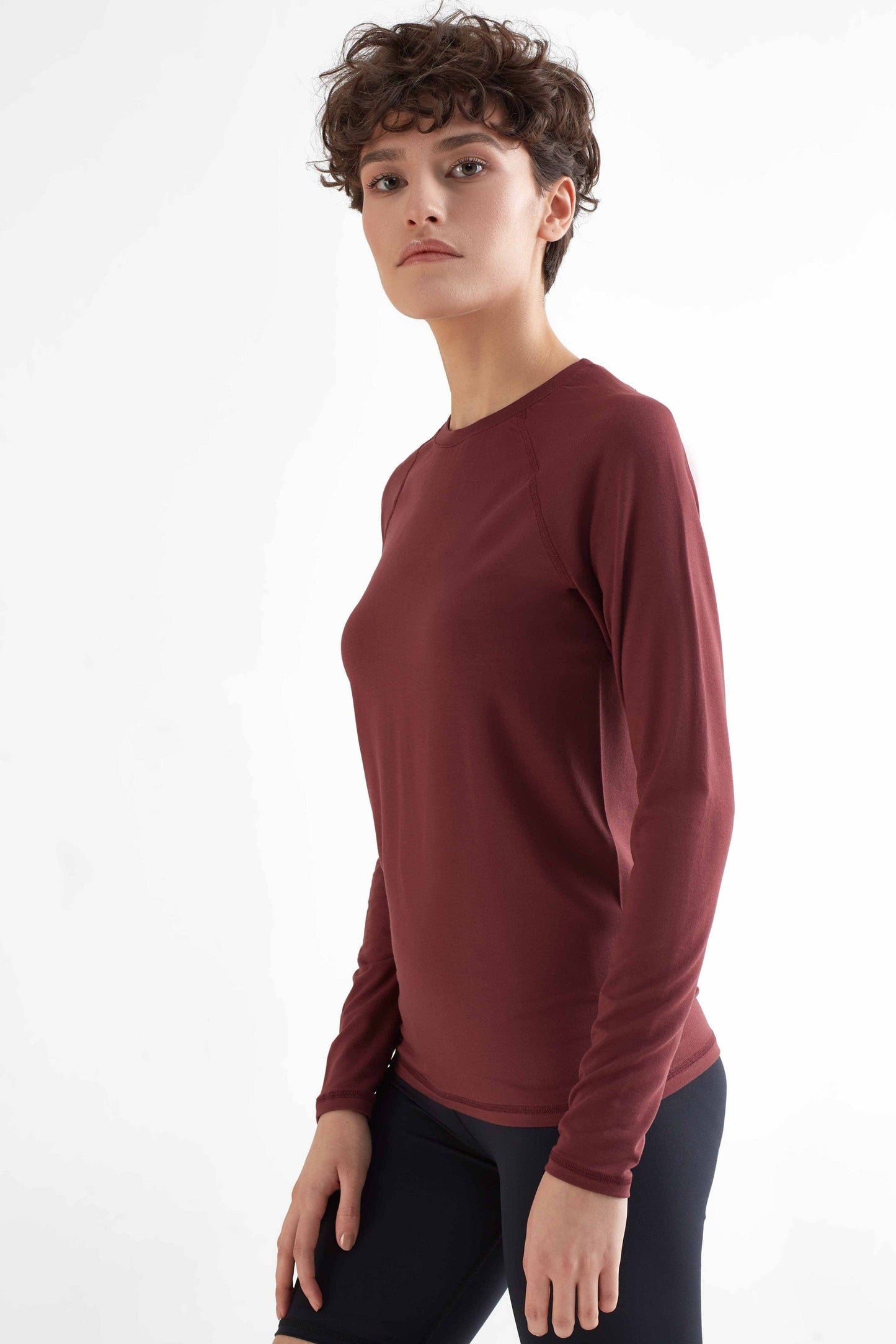 Close-up view of the soft, moisture-regulating micromodal and elastane fabric of our women's luxury long sleeve shirt, ideal for active and casual wear.