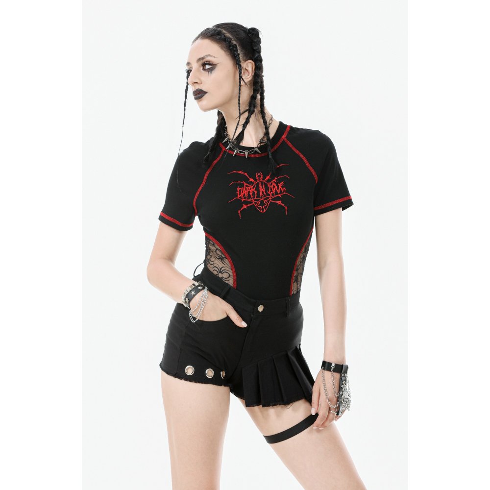 Stylish model showcasing high-waisted black garter shorts with detachable garter strap, perfect for a refined yet daring alternative look.