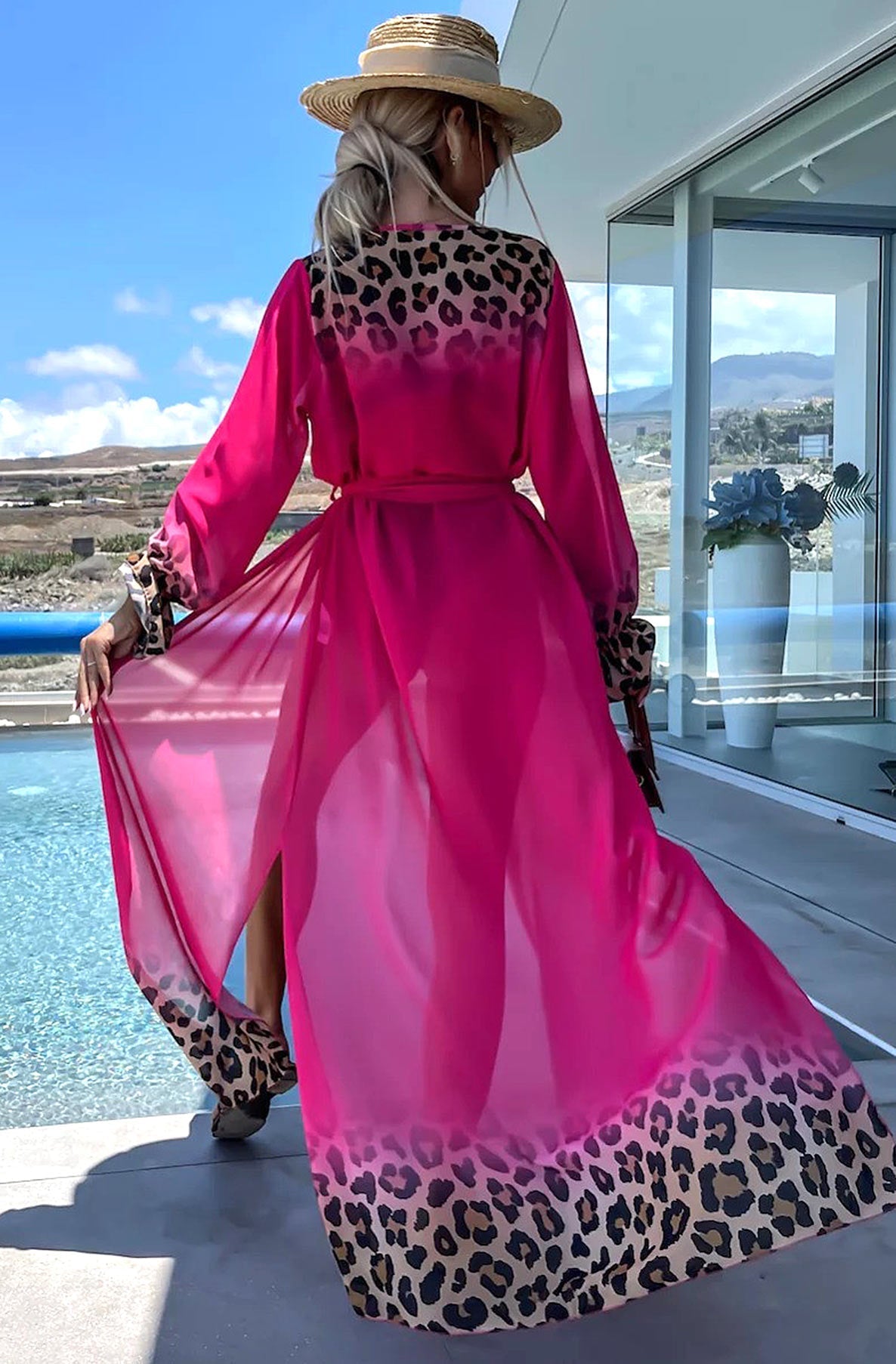Luxurious Alora Ombre Leopard Print Beach Maxi Dress showcasing a chic open-front wrap design, perfect for glamorous beach getaways.