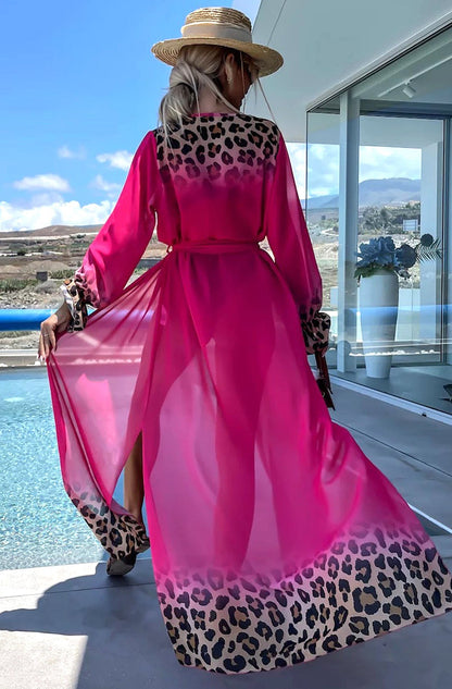 Luxurious Alora Ombre Leopard Print Beach Maxi Dress showcasing a chic open-front wrap design, perfect for glamorous beach getaways.