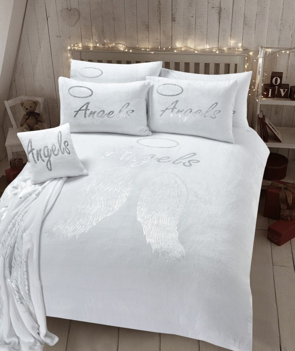 Complete bedding ensemble including the Angel Wings Teddy Duvet Set with matching decorative pieces for a cohesive look.