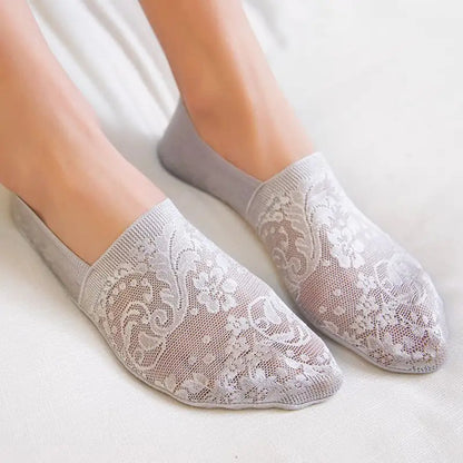 Elegant close-up of Dazzling Dreams Studio Women's Summer Lace Flower Ankle Socks showcasing a delicate floral design for luxurious comfort.