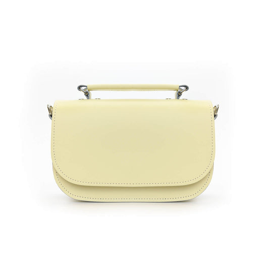 Aura Luxury Handmade Leather Handbag in Cream showcasing elegant craftsmanship with striking cable stitching and chic silver nickel detailing.