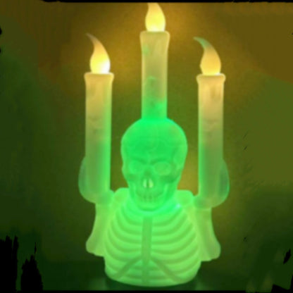 Mesmerizing Halloween Skull Candlestick Lamp radiating an eerie green glow, enhancing your spooky décor for Halloween festivities.