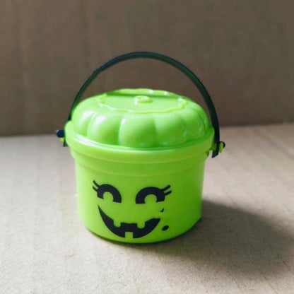 Elegant Halloween Pumpkin Bucket with Straw Mouthpiece, featuring a vibrant green colour and whimsical facial design, ideal for festive decorations and treat collection. Perfect addition to your Halloween celebrations.