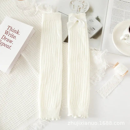 Cozy luxury women's lace bow loose socks by Dazzling Dreams Studio, beautifully arranged to emphasise the softness and elegant lace detail suitable for any occasion.