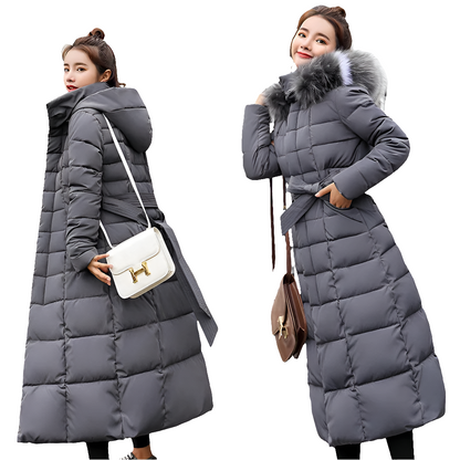 Stylish solid colour women's parka with decorative sashes, combining functionality and elegance for winter wear.