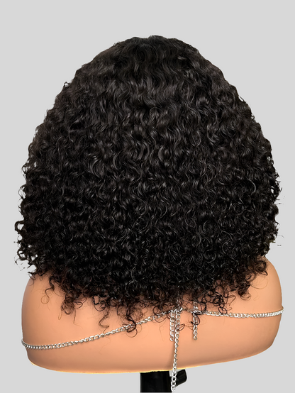 Chic and sophisticated glueless lace closure bob wig, adorned with natural-looking curls, showcasing the rich, deep hues of Brazilian Remy hair designed for a luxurious appeal.