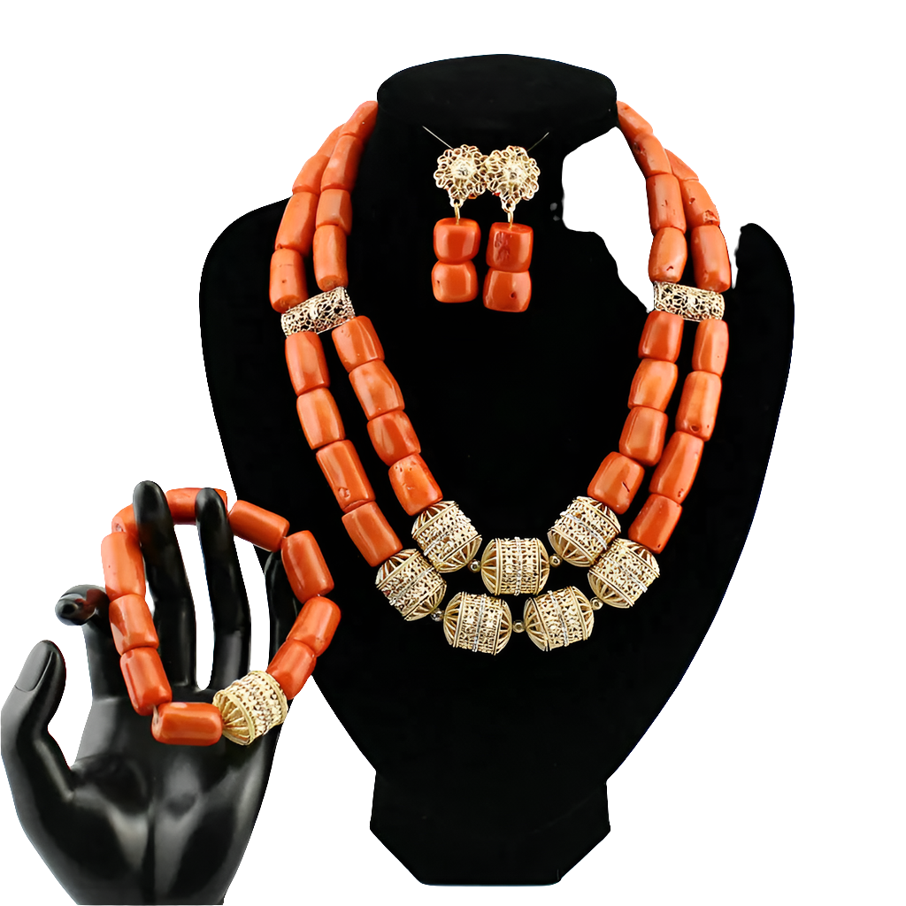Complete luxury coral bead jewellery set featuring a necklace, earrings, and bracelet, perfect for enhancing personal style at weddings and festive events, with a touch of African elegance.