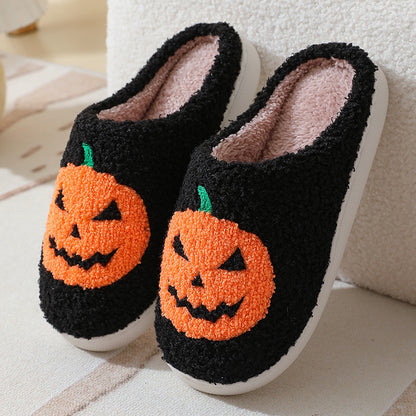 Stylish Halloween Pumpkin Cartoon Slippers in black, showcasing a vibrant pumpkin motif, ideal winter footwear for men and women seeking comfort and festive charm.