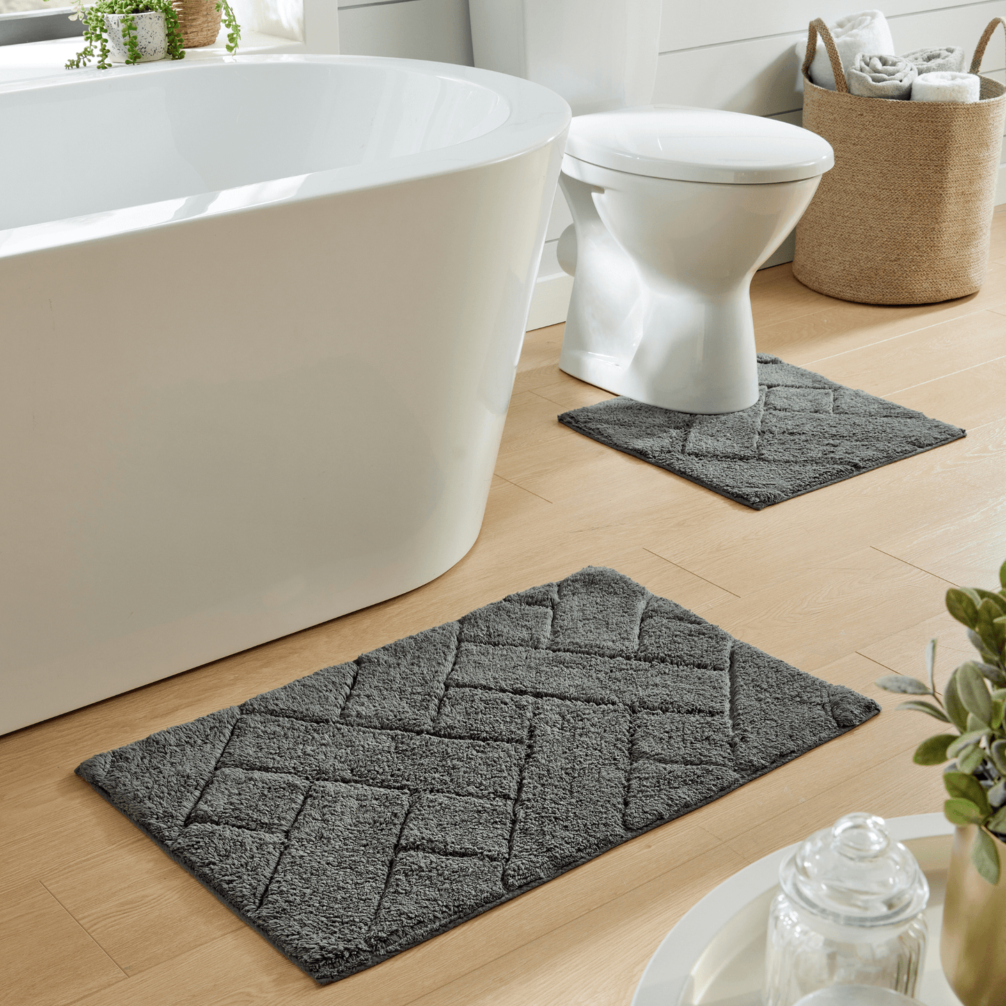 Luxurious Bali Bath Mat & Pedestal Set by OLIVIA ROCCO displaying premium 100% cotton fabric, showcasing elegance and sophistication in a stylish bathroom setting.
