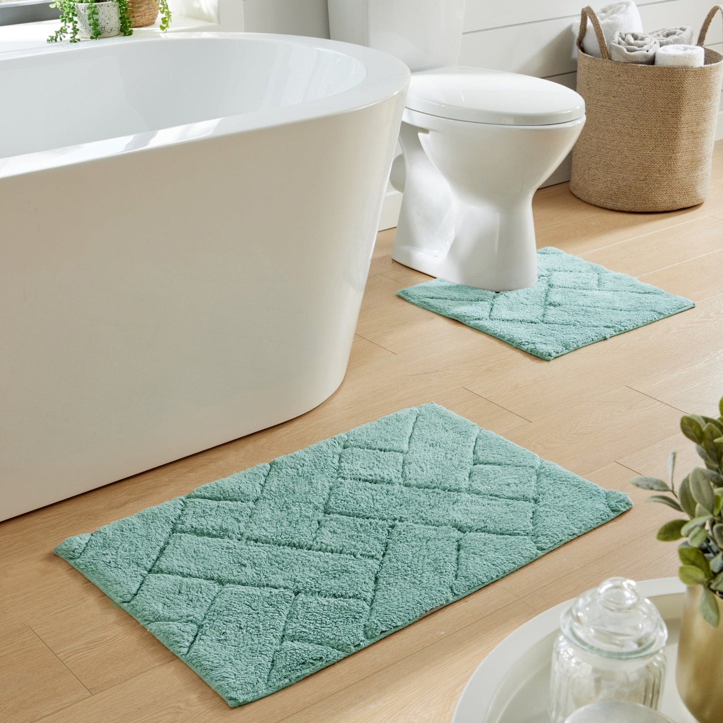 Elegant Bali Bath Mat & Pedestal Set featuring a stylish grey design, crafted from premium cotton for ultimate bathroom comfort and absorbency.