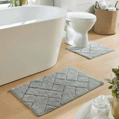 Bali Bath Mat & Pedestal Set artfully arranged in multiple colours, illustrating its stylish design and suitability for diverse bathroom decors, a touch of luxury.