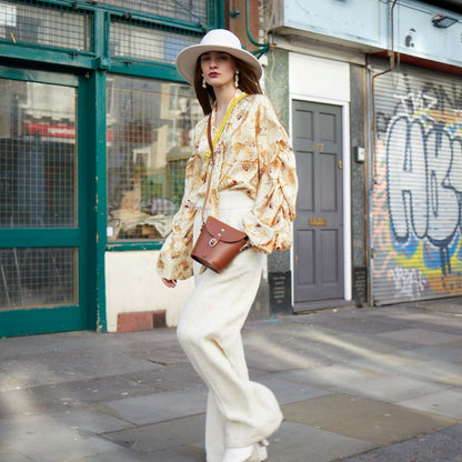 Interior of the Handmade Leather Barrel Bag showcasing its spacious compartment, perfect for essentials, with personalised engraving option for unique elegance.