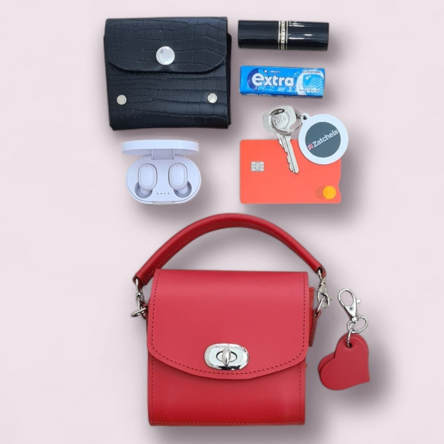 Luxury Handmade Bauble Leather Handbag in Pillar Box Red, featuring a heart charm, measuring 12cm x 11.5cm x 9cm - a chic accessory ideal for any occasion.