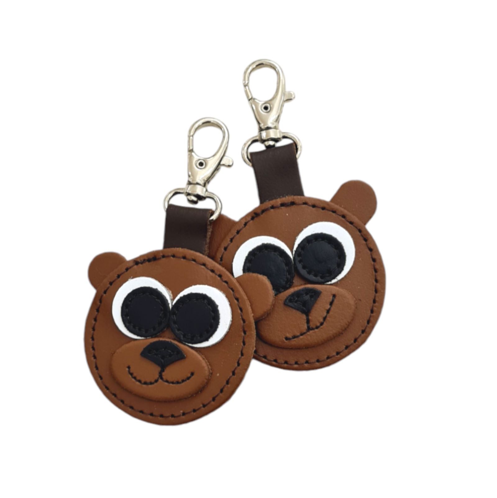 Exquisite handmade brown bear leather bag charm, thoughtfully crafted in England, showcasing unique design and superior craftsmanship in a luxurious accessory for bags and keys.