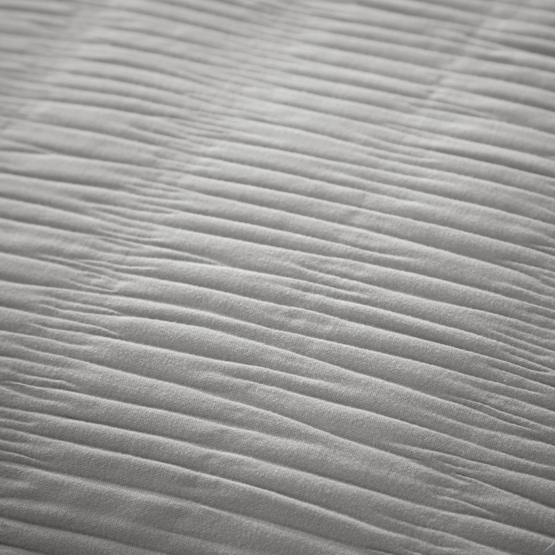 Luxurious Belgravia Grey Microfibre Duvet Cover Set elegantly displayed on a stylish bed, showcasing its soft fabric and modern design, perfect for sophisticated bedroom aesthetics.