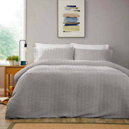 Luxurious Belgravia Grey Microfibre Duvet Cover Set featuring ultra-soft fabric, perfect for modern bedrooms, enhances elegance and comfort with its timeless grey design.