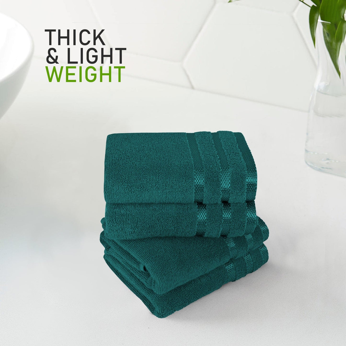 Luxurious Belmont Jade Green Stripe Towel Set showcasing plush 100% cotton material, ideal for a bathroom upgrade.