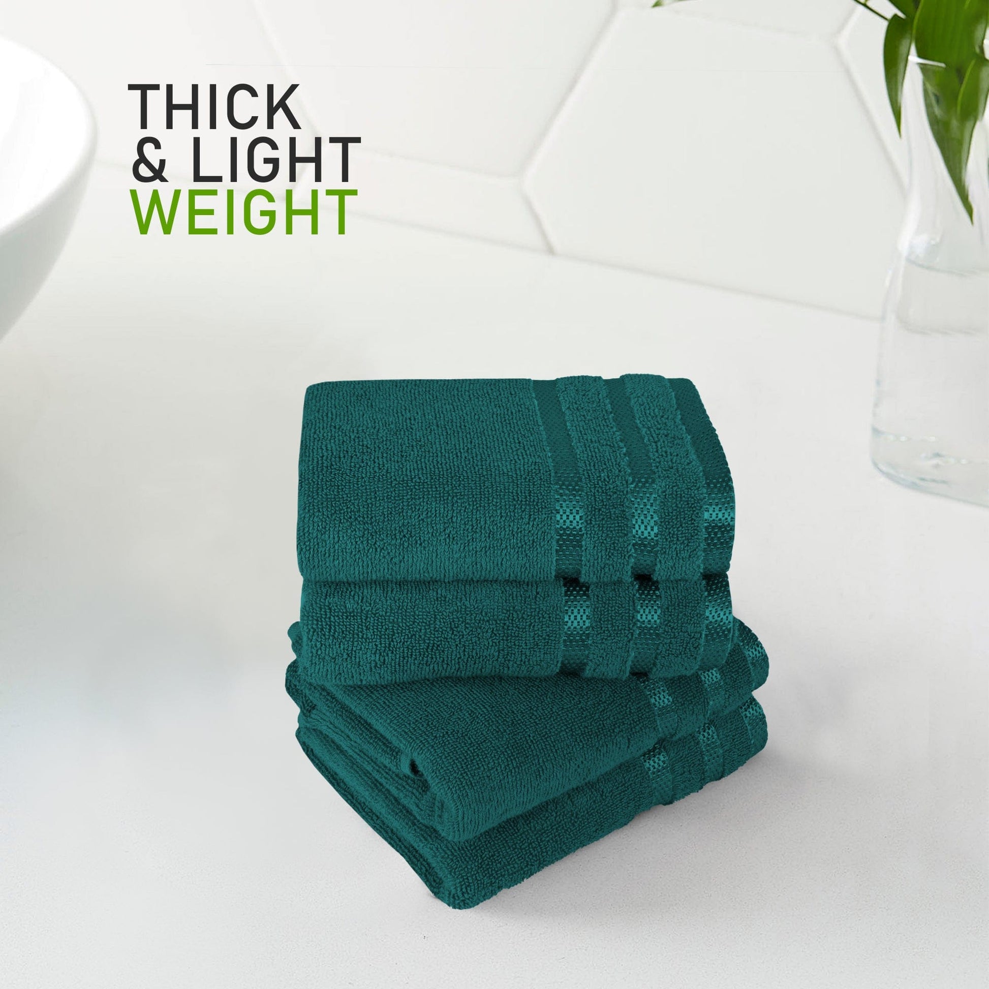 Luxurious Belmont Jade Green Stripe Towel Set showcasing plush 100% cotton material, ideal for a bathroom upgrade.
