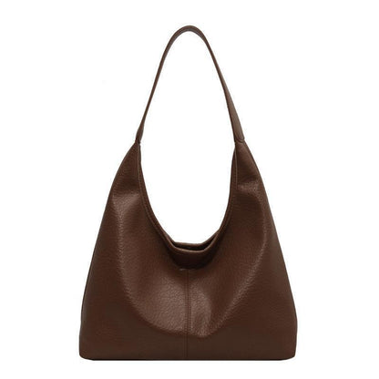 Chic and elegant faux leather wallet matching the luxury shoulder bag, designed for the modern woman who appreciates style and functionality.