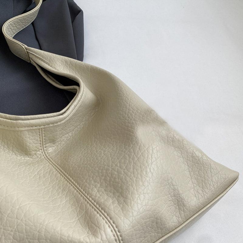 Chic faux leather handbag set from Glooosy Store, featuring a sophisticated wallet and shoulder bag, designed to elevate any woman's wardrobe.