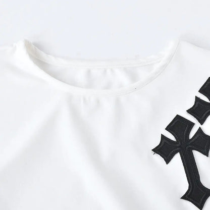 Close-up of the embroidered design on Dazzling Dreams Studio's Women's Bless Up Embroidered Crop Tee, emphasising the high-quality craftsmanship and fashionable appeal.