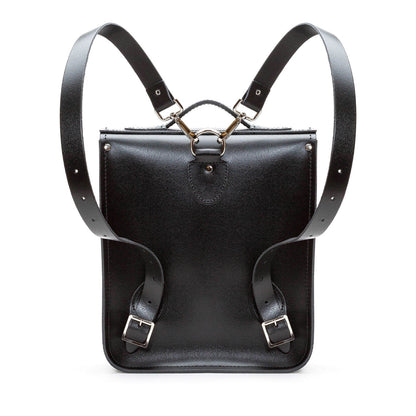 Gothic Striped Grey & Black Leather Backpack styled as a cross-body, demonstrating its adaptable function and chic gothic aesthetic.