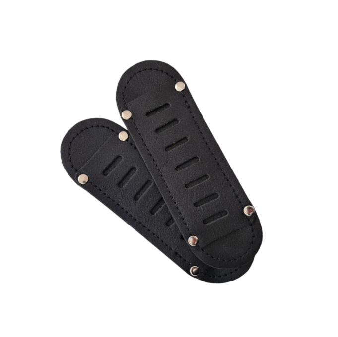 Handcrafted men's black leather tannery backpack displayed with shiny nickel hardware, epitomizing sophistication and elegance.