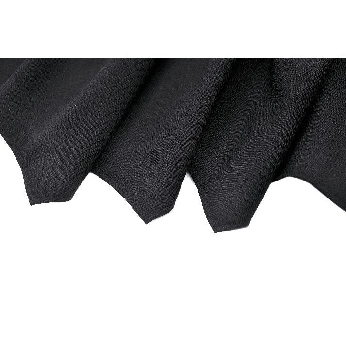 Close-up view of Dark in Love Keziah High Waisted Skirt, highlighting the luxurious polyester fabric and flattering smocked waistband.