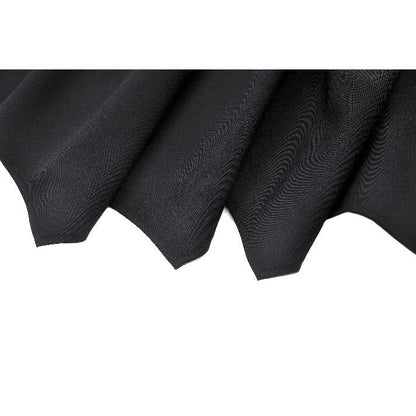 Close-up view of Dark in Love Keziah High Waisted Skirt, highlighting the luxurious polyester fabric and flattering smocked waistband.