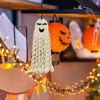 Delightful Halloween Ghost Hanging Decoration highlighting a smiling ghost with long curly strands, gracefully arranged amidst festive lanterns and twinkling lights, ideal for a luxurious Halloween celebration.