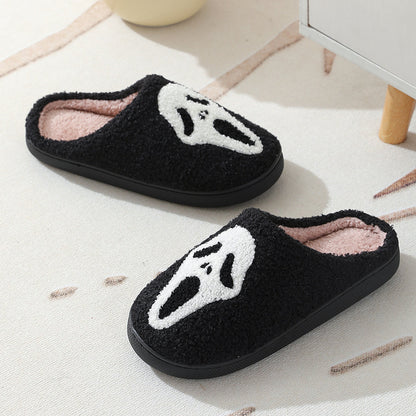 Halloween Skull Cartoon Print Slippers designed for luxury comfort, featuring a stylish black exterior with a playful skull motif, perfect for warming your feet during winter.