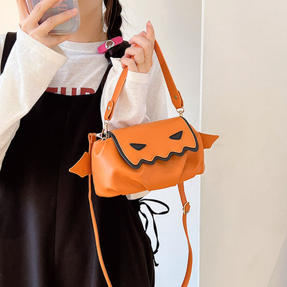Versatile PU Crossbody Bags for Women - Trendy Orange & Black Halloween Style, highlighted on a model dressed in a black dress, posing with the bag.