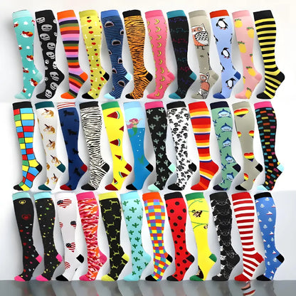 A vibrant collection of women's knee length compression travel socks featuring unique designs and patterns, designed for comfort, style, and circulation during travels.