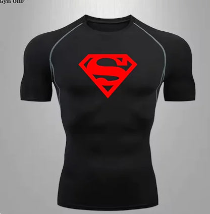 Men's high-performance compression t-shirt in black, embellished with a vibrant red Superman emblem, ideal for fitness enthusiasts.