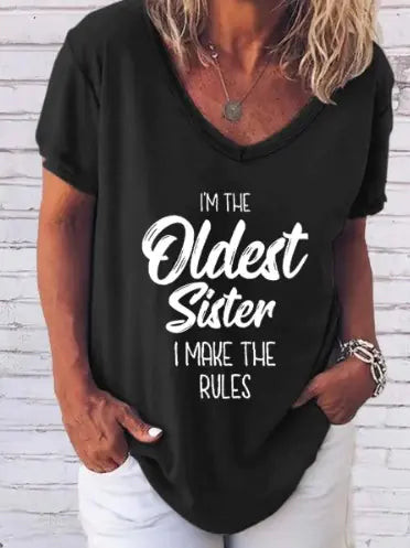 Elegant display of the 'I'm The Oldest Sister' tee from Dazzling Dreams Studio, showcasing high-quality fabric and empowering message for eldest sisters.