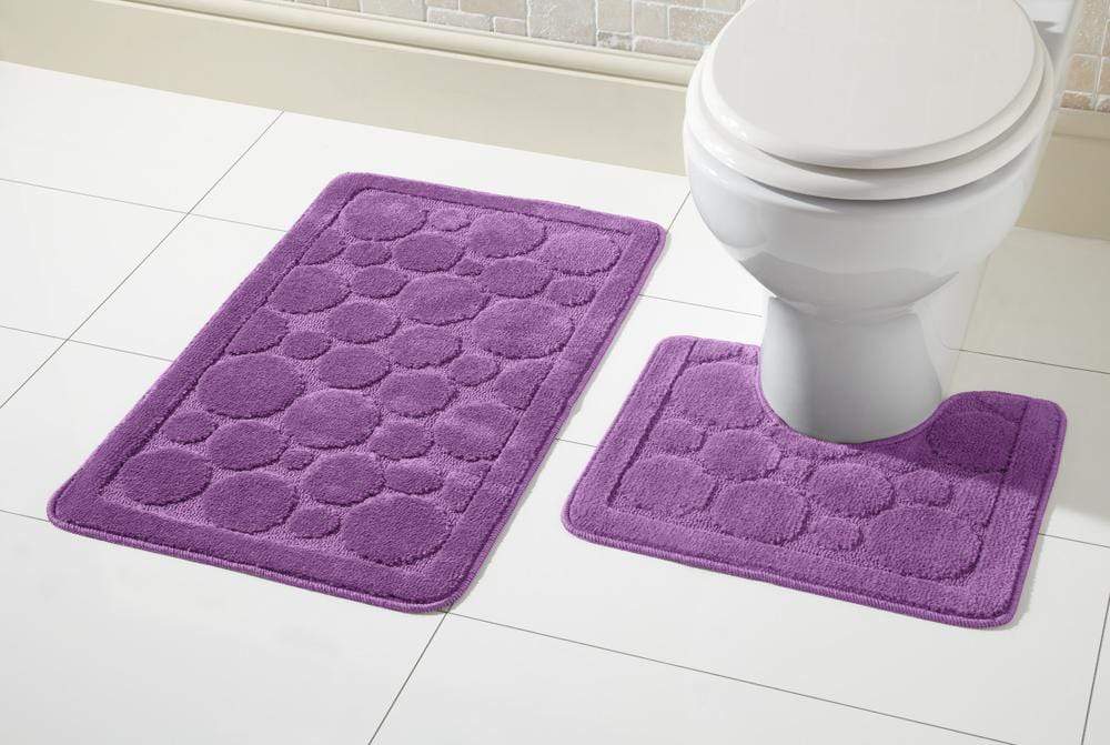 Close-up of the non-slip backing of the Cali Bath Mat Set, demonstrating safety features essential for secure footing in wet environments.