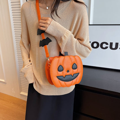 2023 Halloween Bags Funny Pumpkin Cartoon Shoulder Crossbody Bag beautifully paired with a luxury knit sweater, creating a playful yet elegant holiday look.