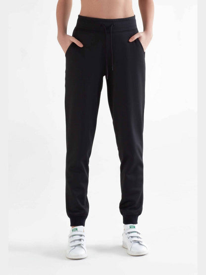 Luxurious women's recycled polyester sweatpants featuring tapered legs and an elastic waistband, designed for eco-conscious sportswear enthusiasts.