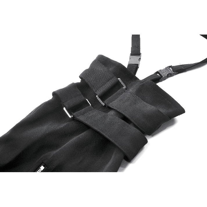 Elegant model showcasing Dark In Love Convertible High-Waisted Lace-Up Goth Trousers and Shorts in black, exuding a bold goth aesthetic.