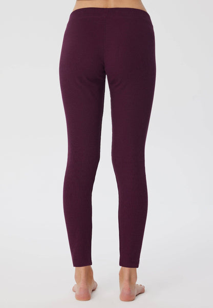 Elegant women's organic cotton ribbed leggings featuring a soft elasticated waist, designed for comfort and style.