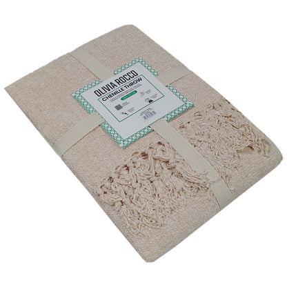 Luxurious chenille throw blanket with elegant tassels, measuring 130x170 cm, draped gracefully over a stylish couch. Perfect for adding a touch of sophistication to any living space.