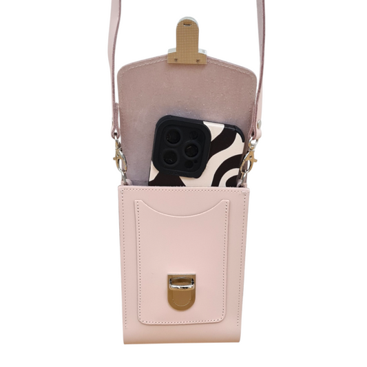 Interior view of the luxury handmade leather crossbody phone case, highlighting spacious compartments for phones and essentials, designed by Zatchels.