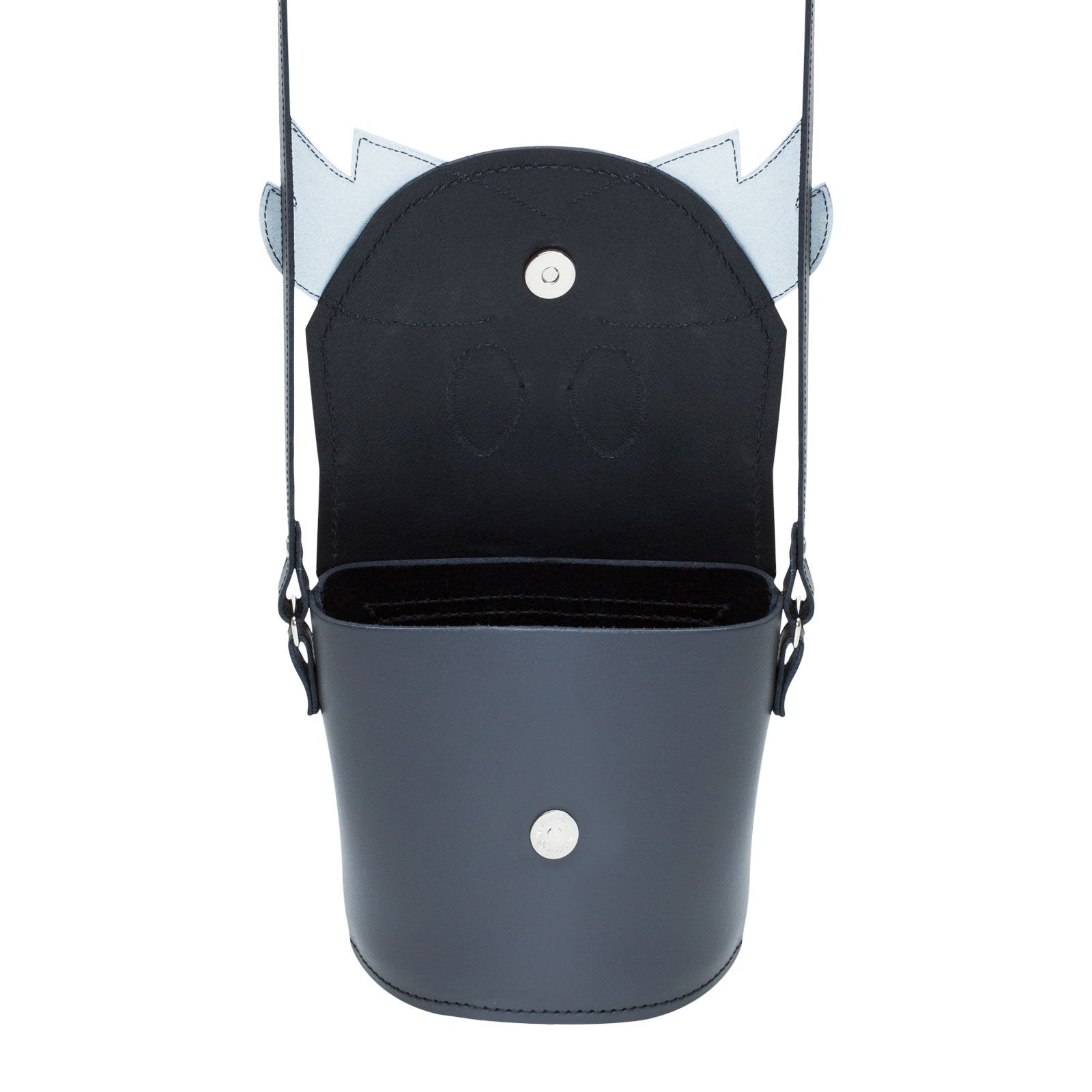 Chester Cat Barrel Bag worn casually, demonstrating its versatility and chic design, suitable for both day and evening wear.